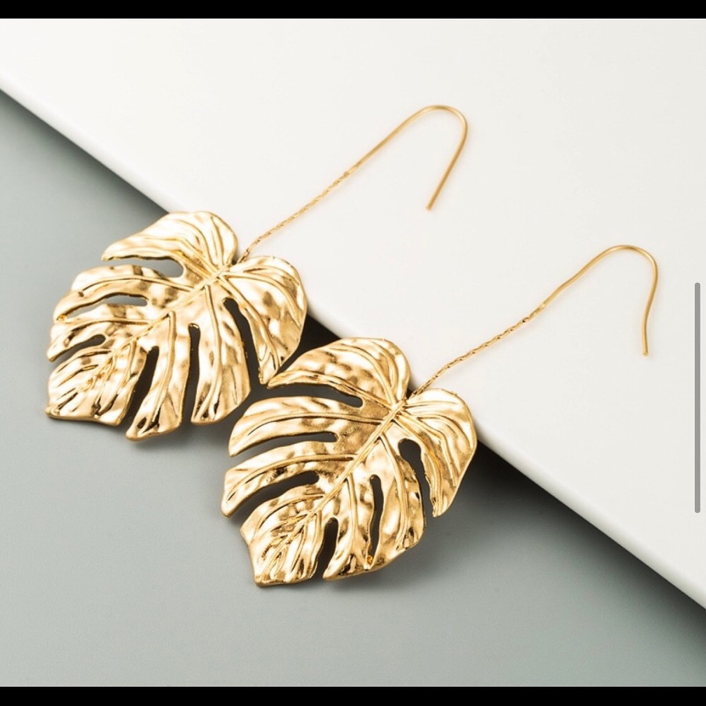 Palm leaf dangle statement earrings.